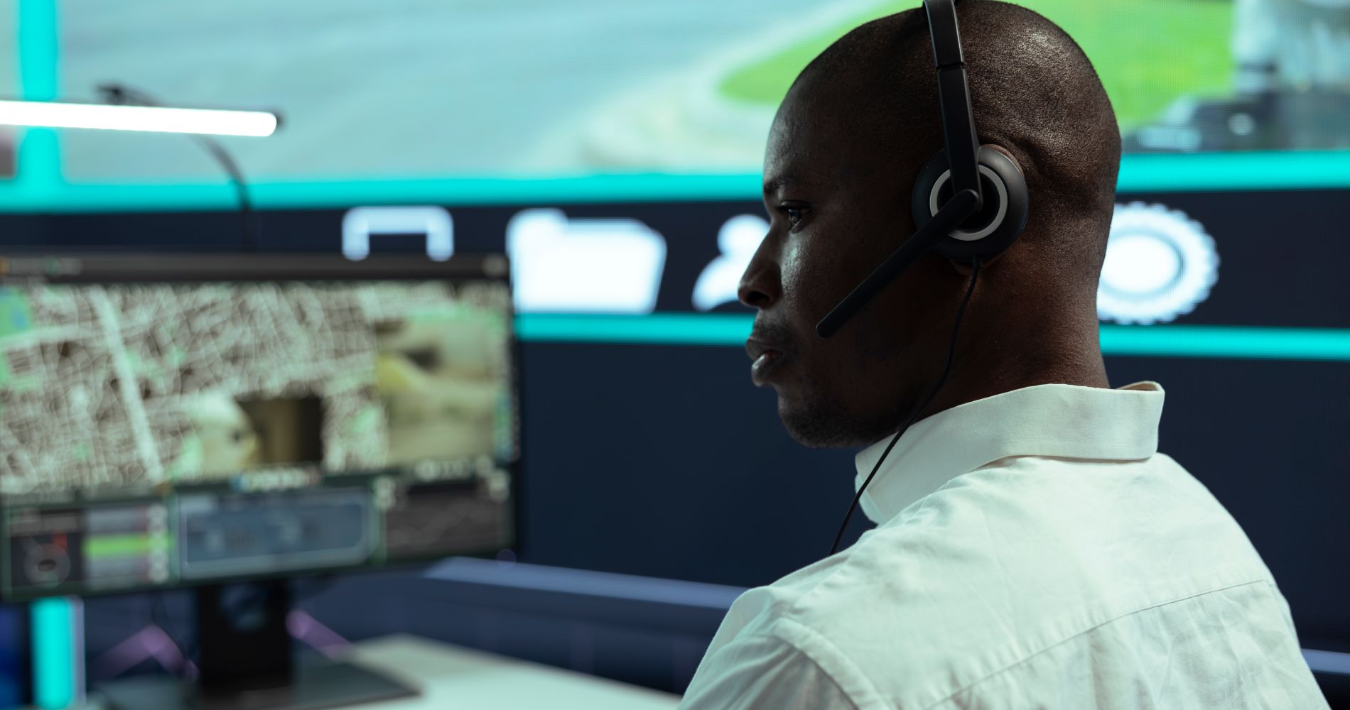 african-american-guy-supervising-traffic-activity-via-cctv-system 1